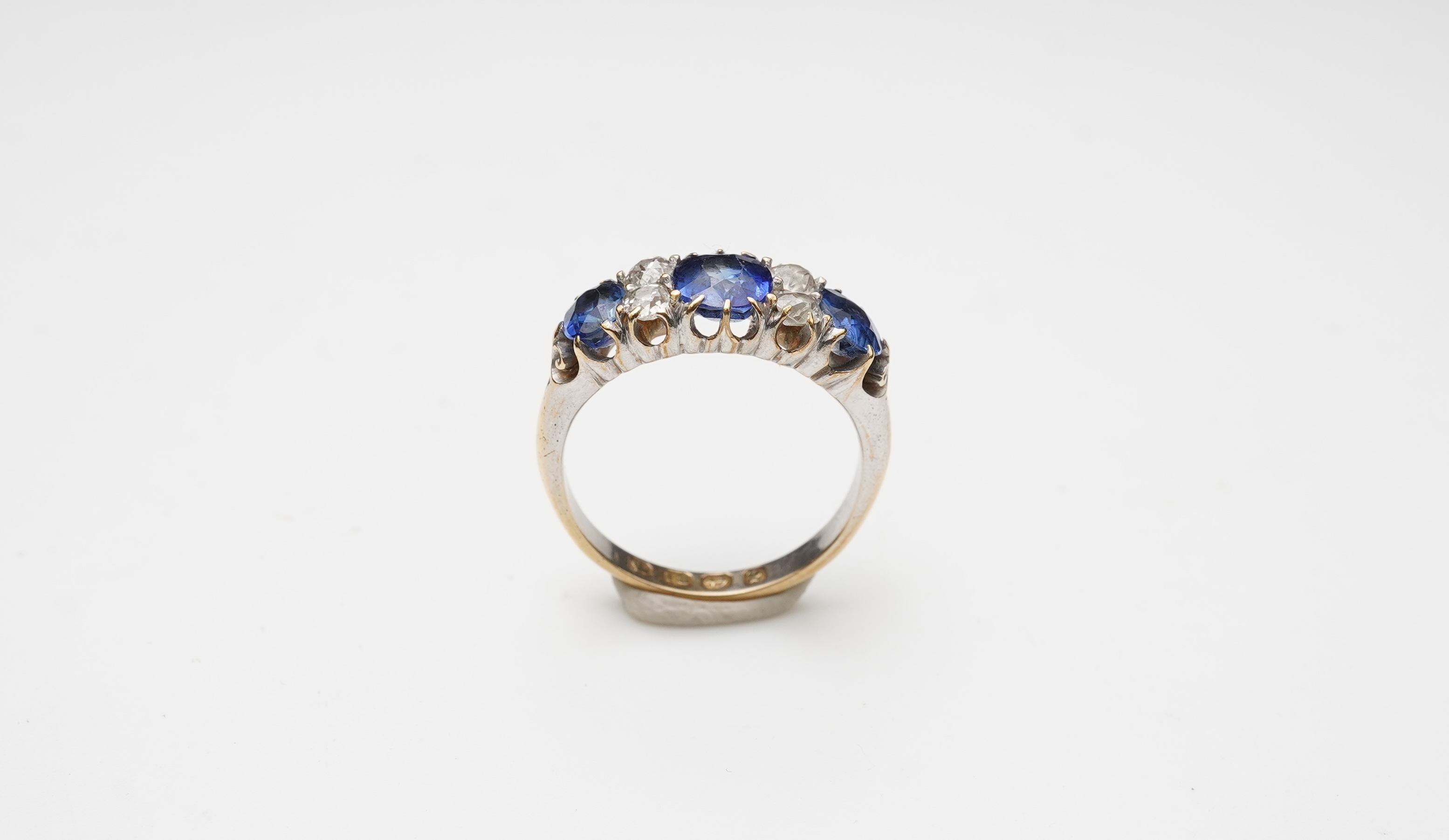 A Victorian sapphire and diamond ring, circa 1889